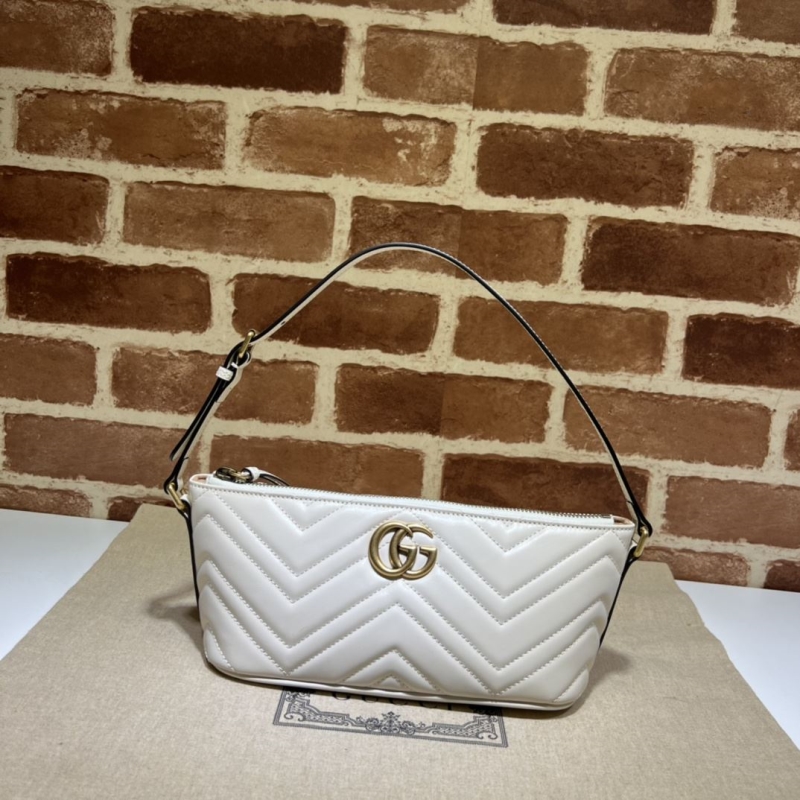 G*u*i top handle bags